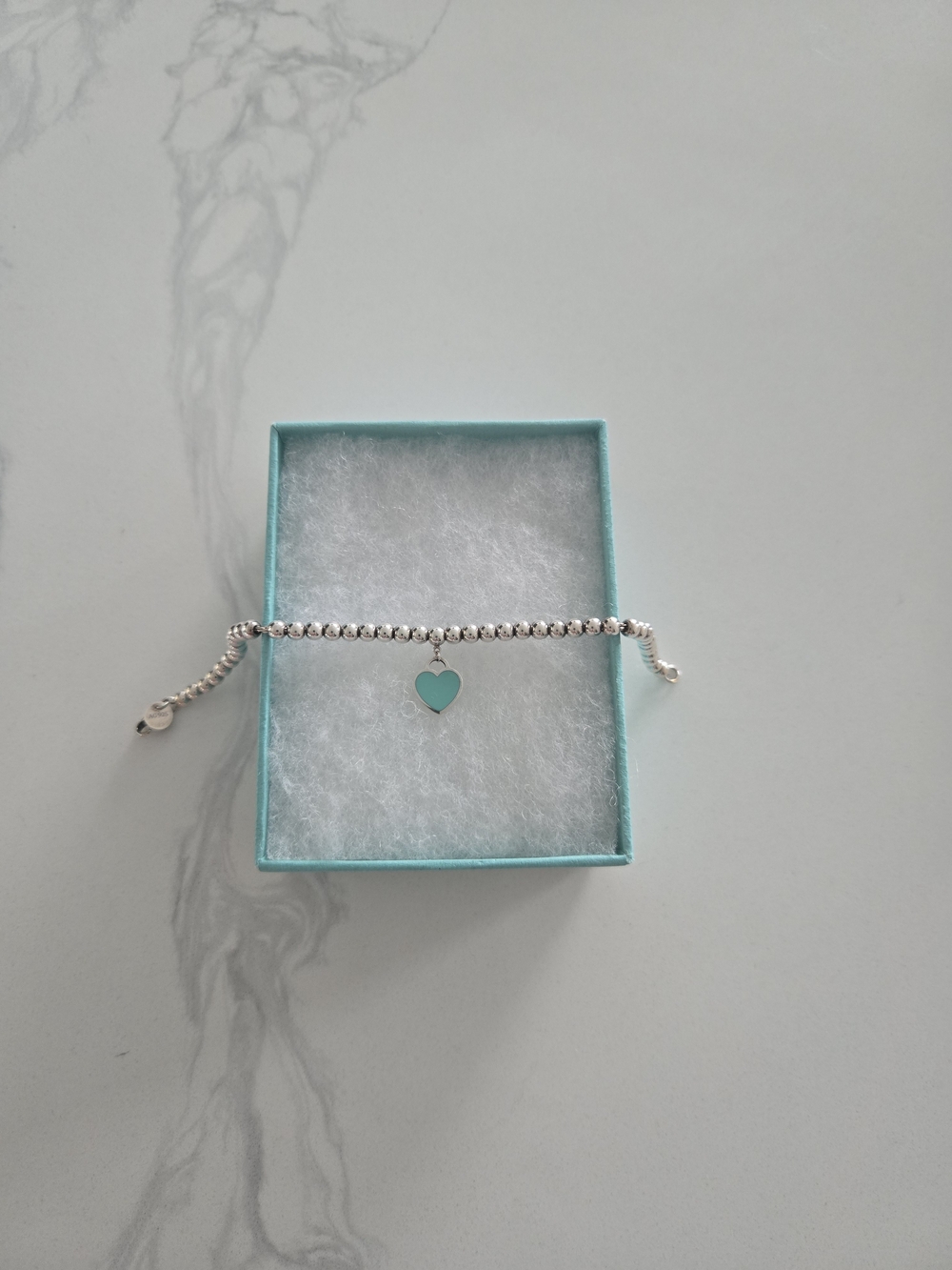 Tiffany & Co. Silver Bead Bracelet with Blue Heart Charm